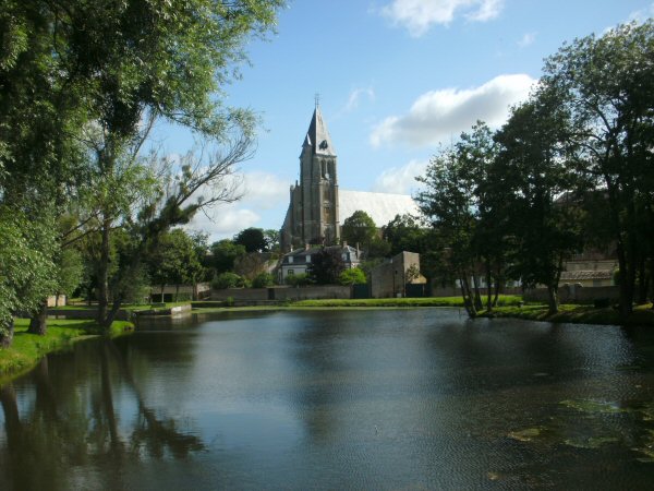 Het meertje met de kerktoren in de verte